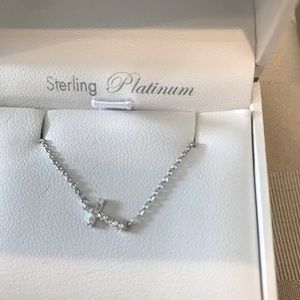 Crislu cubic zirconia sideway cross necklace